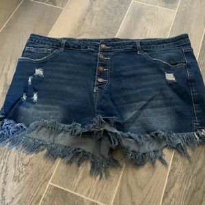 Dark denim distressed cut off shorts